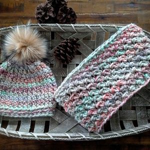Pastel infinity scarf and faux-fur pompom hat